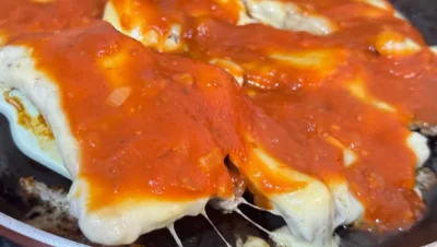 Contra Filé à Parmegiana com Molho de Tomate Caseiro: Receita Fácil e Saborosa